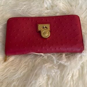 Hot pink Michael Kors wallet.